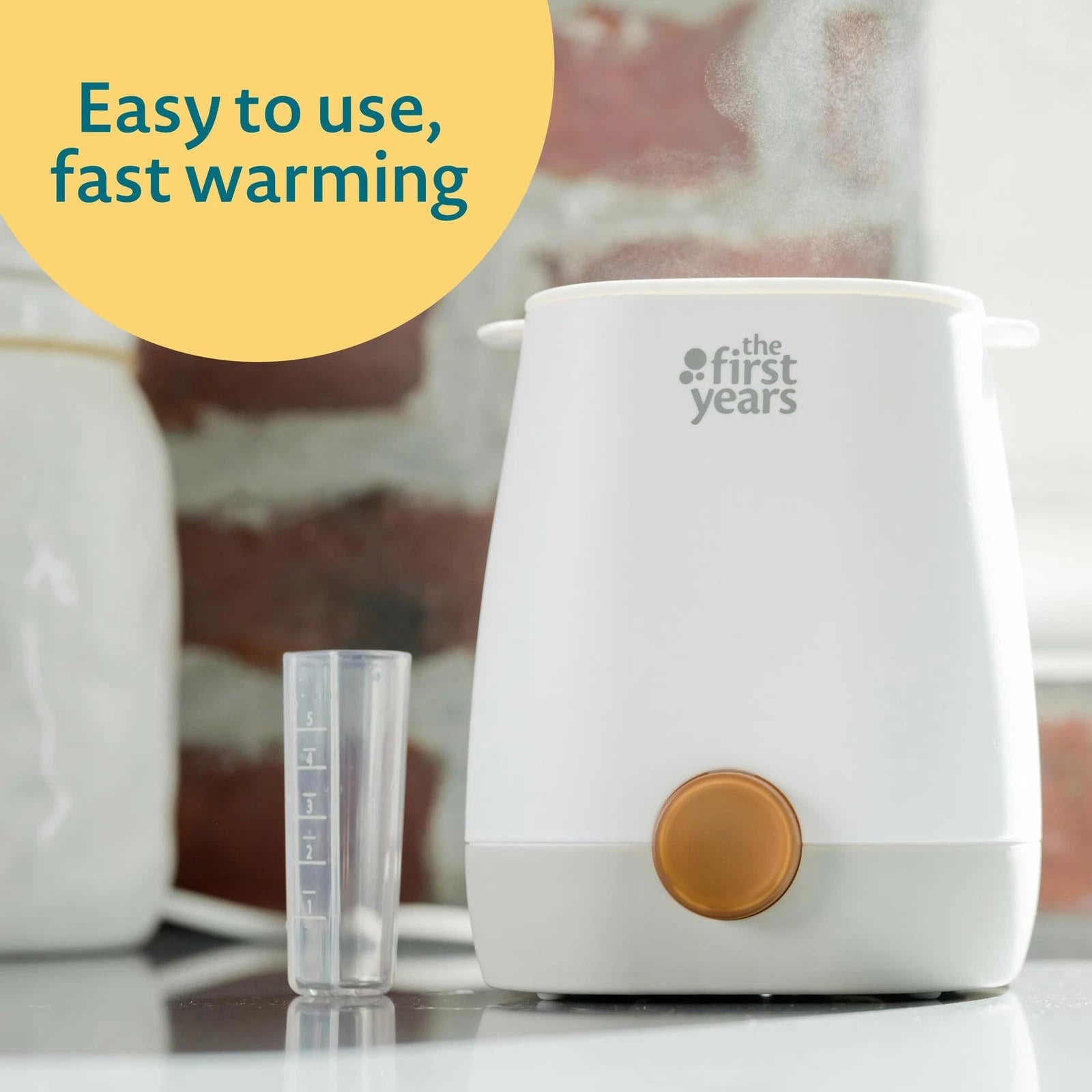 The First Years 2-in-1 Simple Serve Bottle Warmer Quickly Warm Bottles of
