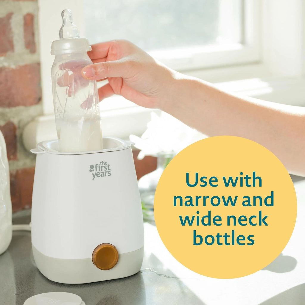 The First Years 2-in-1 Simple Serve Bottle Warmer Quickly Warm Bottles of
