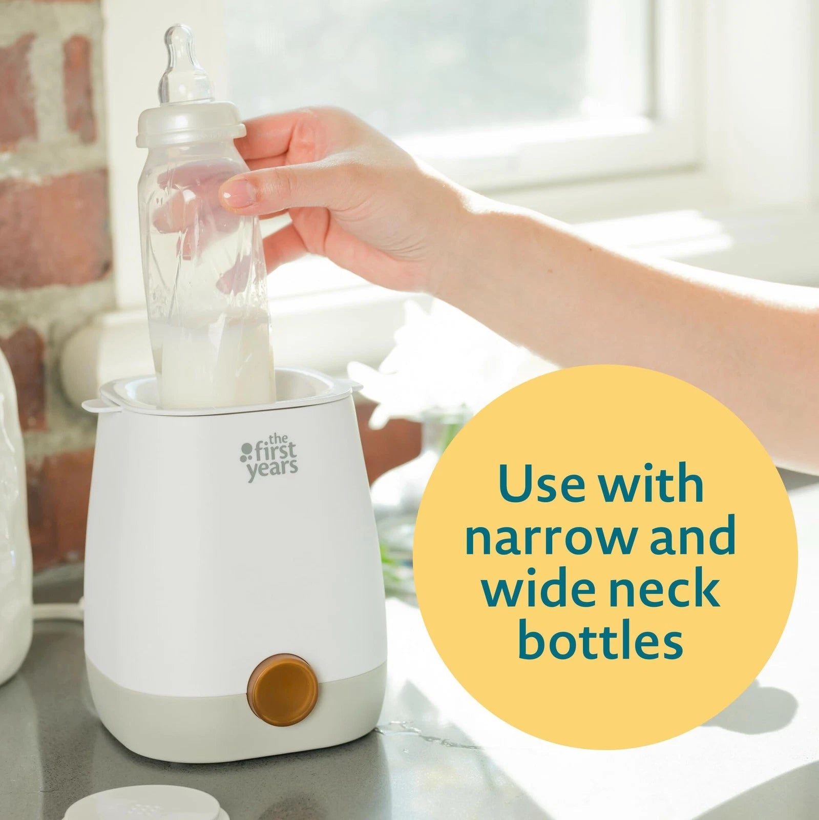 The First Years 2-in-1 Simple Serve Bottle Warmer Quickly Warm Bottles of